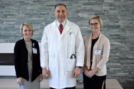 Beebe Medical Staff presents scholarship to nursing student.